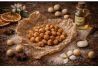 Noix de Macadamia caramélisées - légèrement parfumées à la fleur d'ora